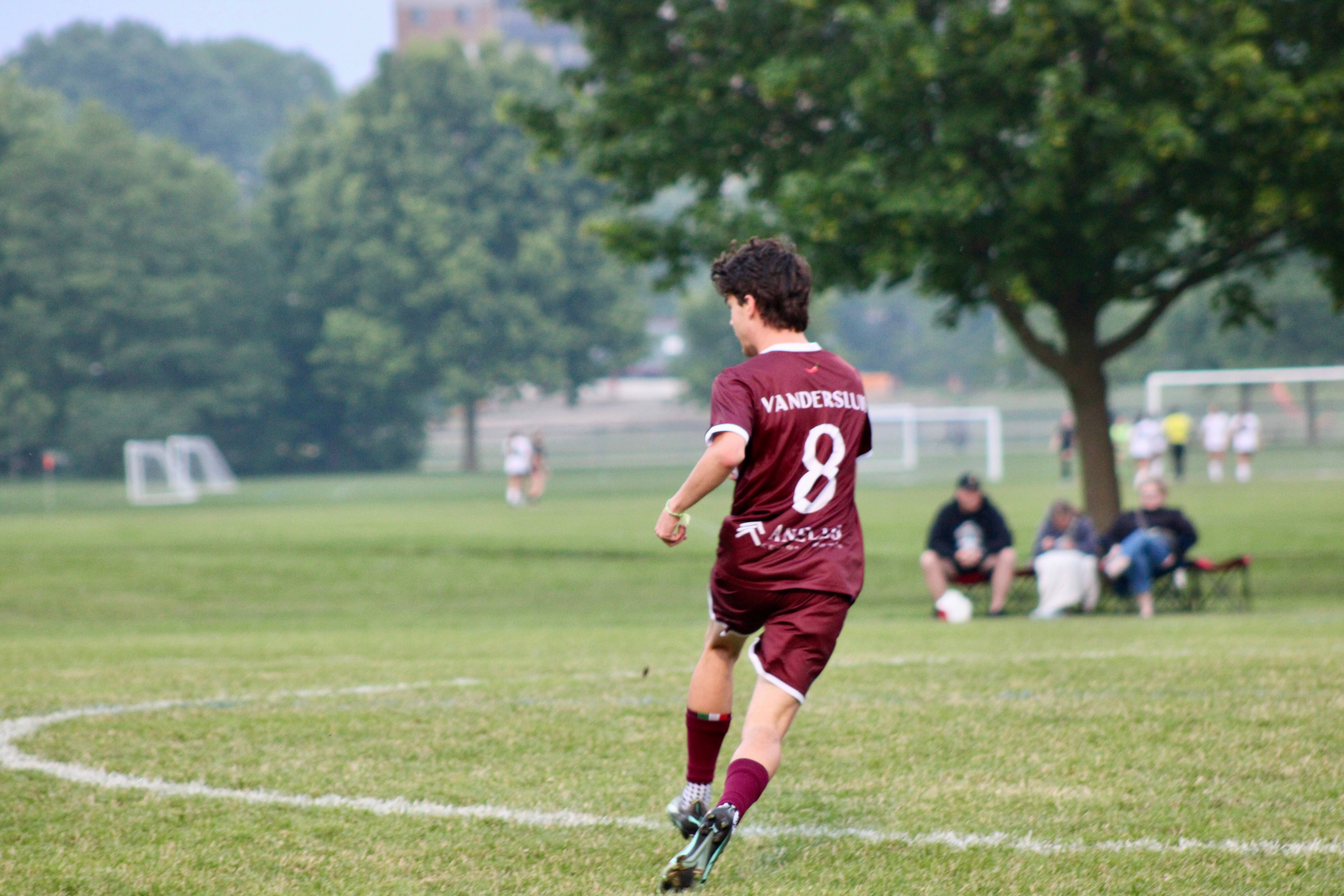 Vandersluis (#8) running during Buringa FC outdoor match
