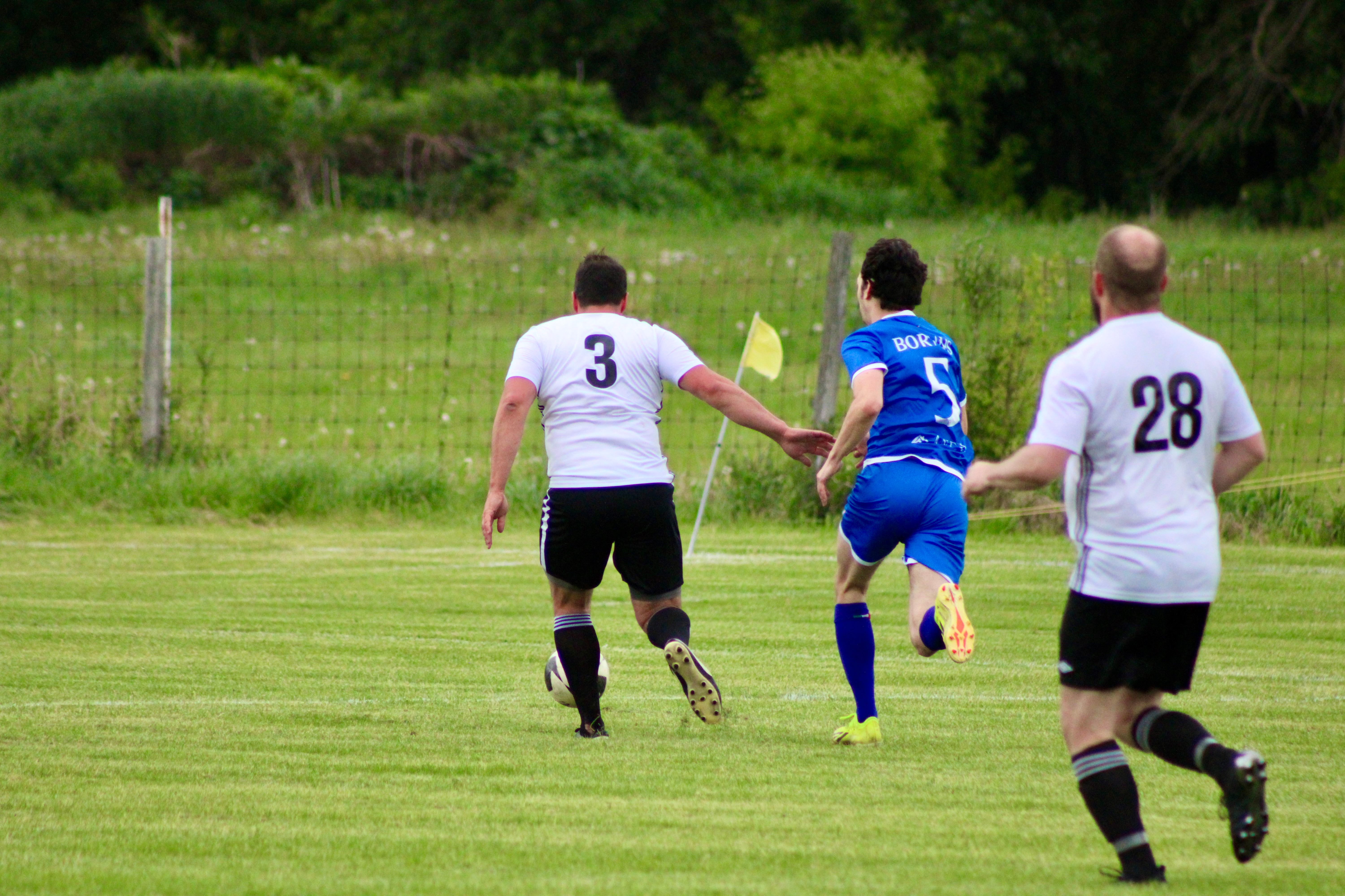 Curinga FC player competing during outdoor 2025 match