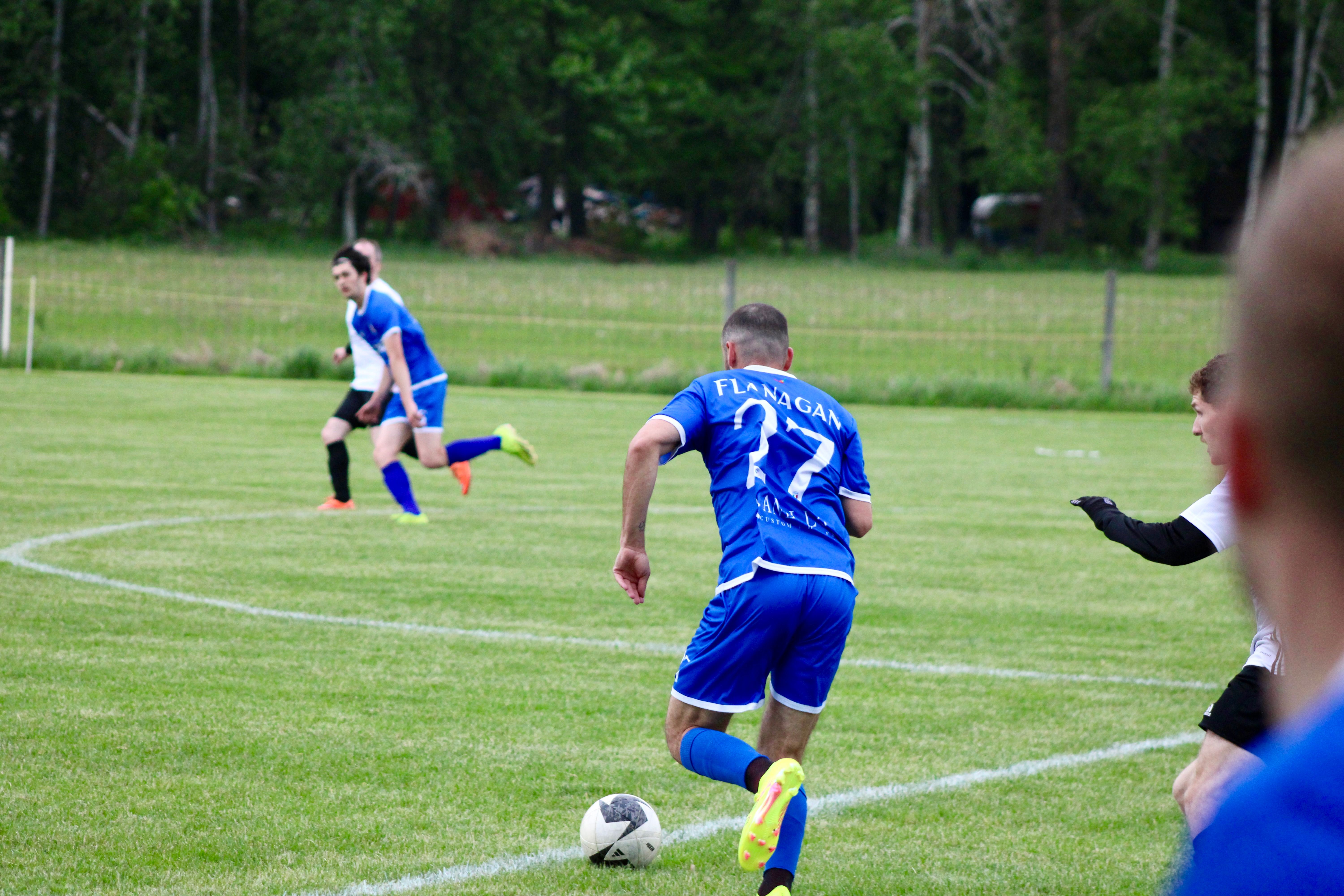 Curinga FC outdoor match moment from 2025 season