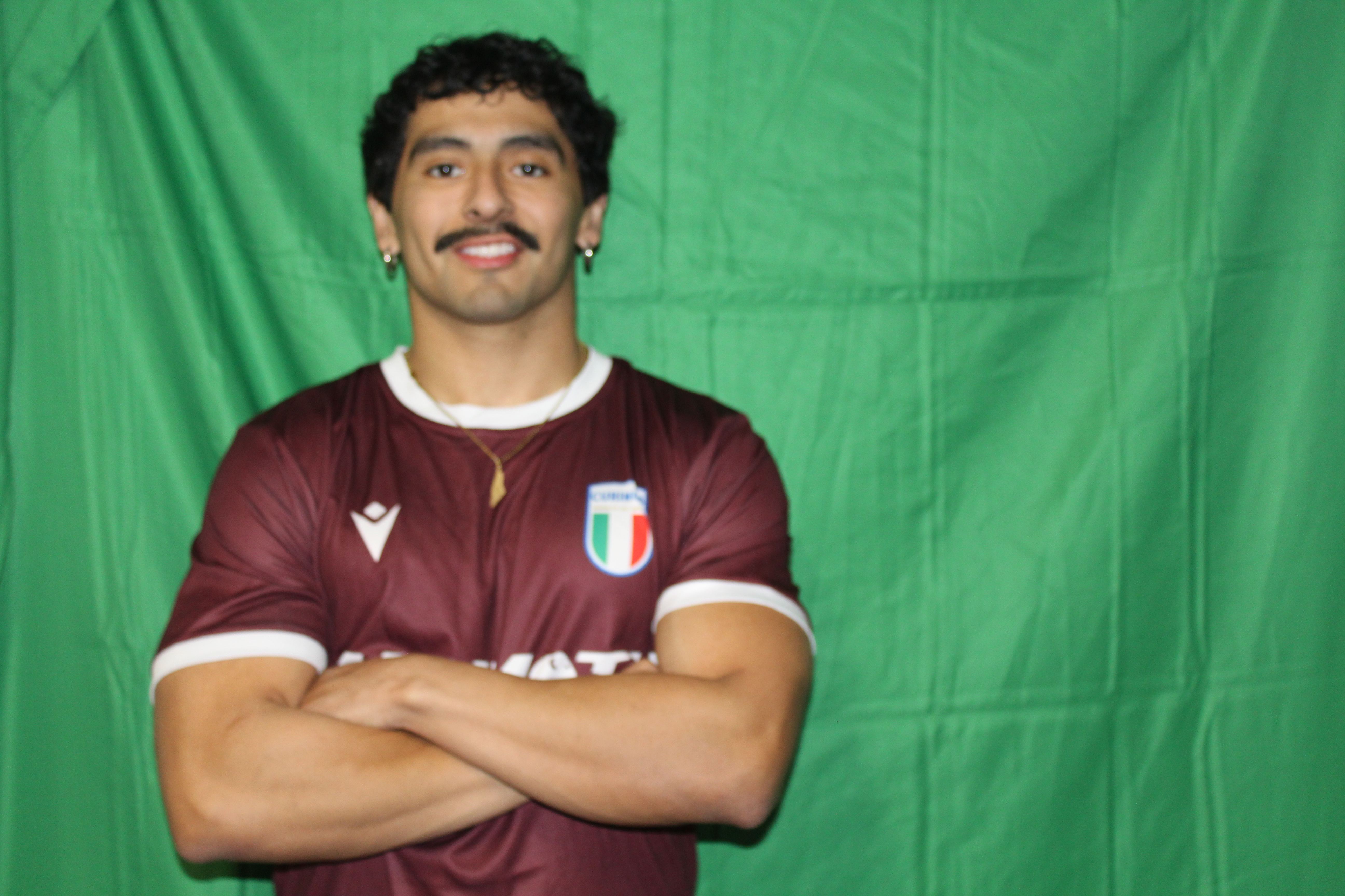Buringa FC player with goatee in team jersey