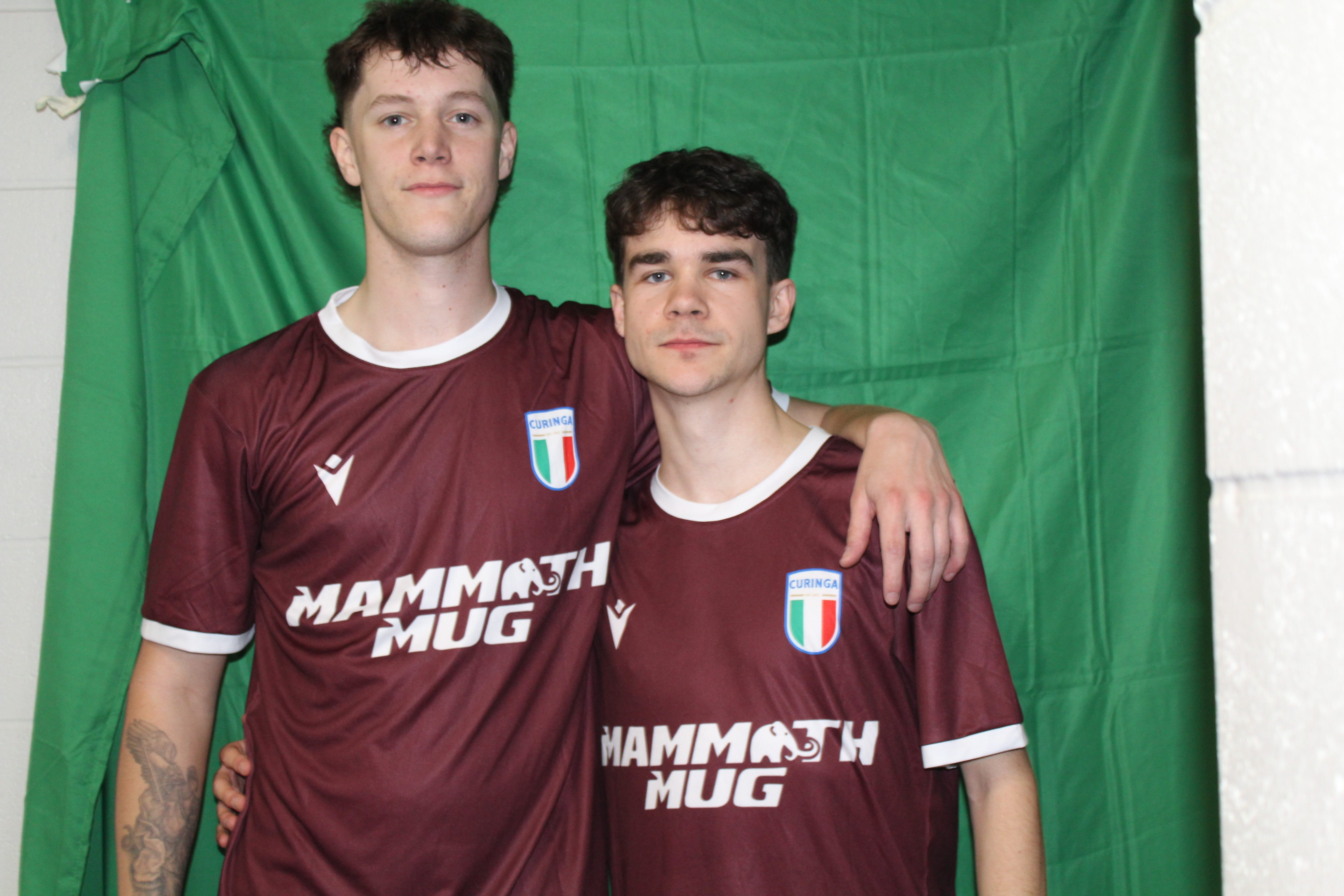 Two Buringa FC players posing together in team jerseys